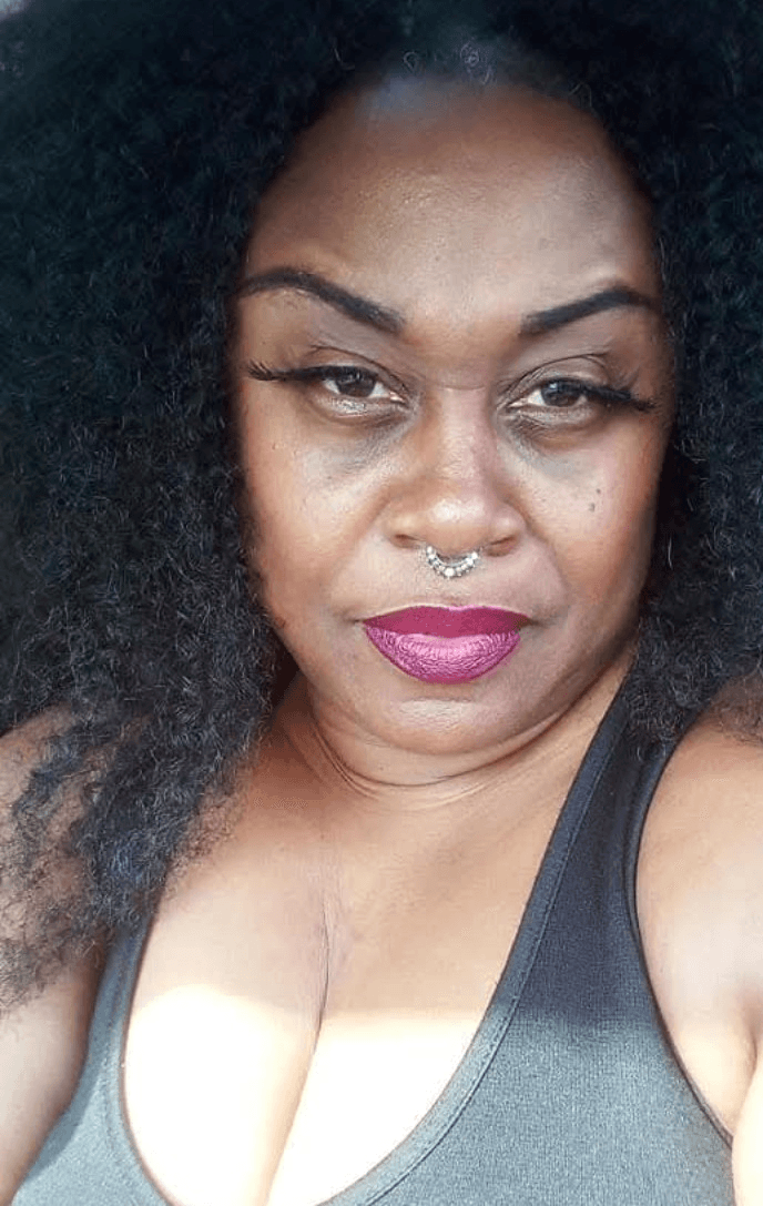 Confident natural healing practitioner with expertise in traditional remedies